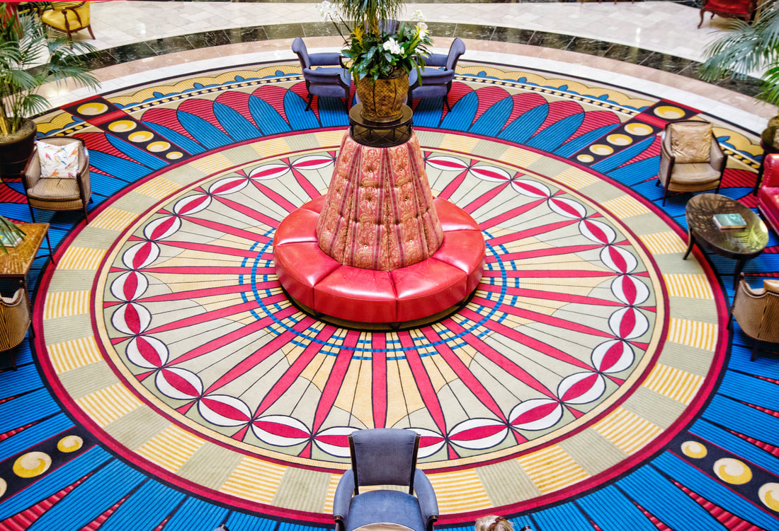 Overhead view of the Battle House lobby rotunda and patterned carpet