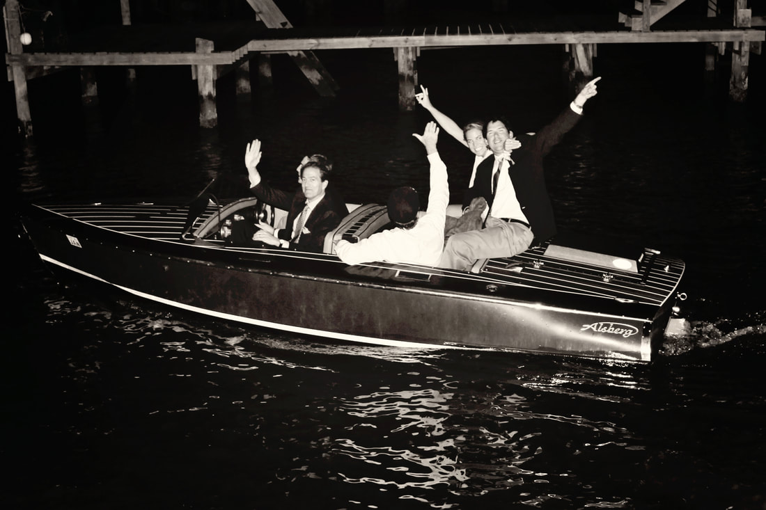 Black and white exit by boat at night