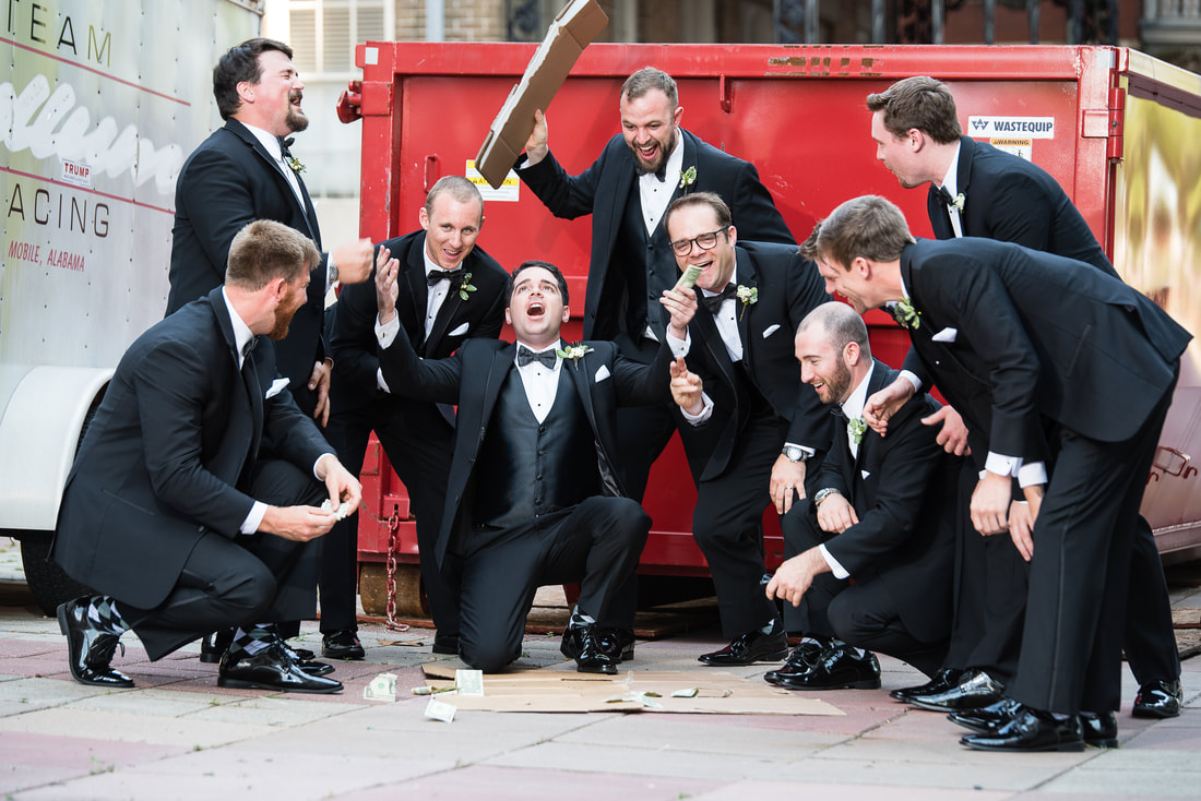 Groomsmen laughing together before the wedding