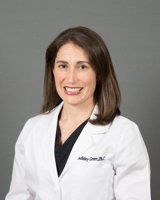 Physician assistant headshot on gray backdrop
